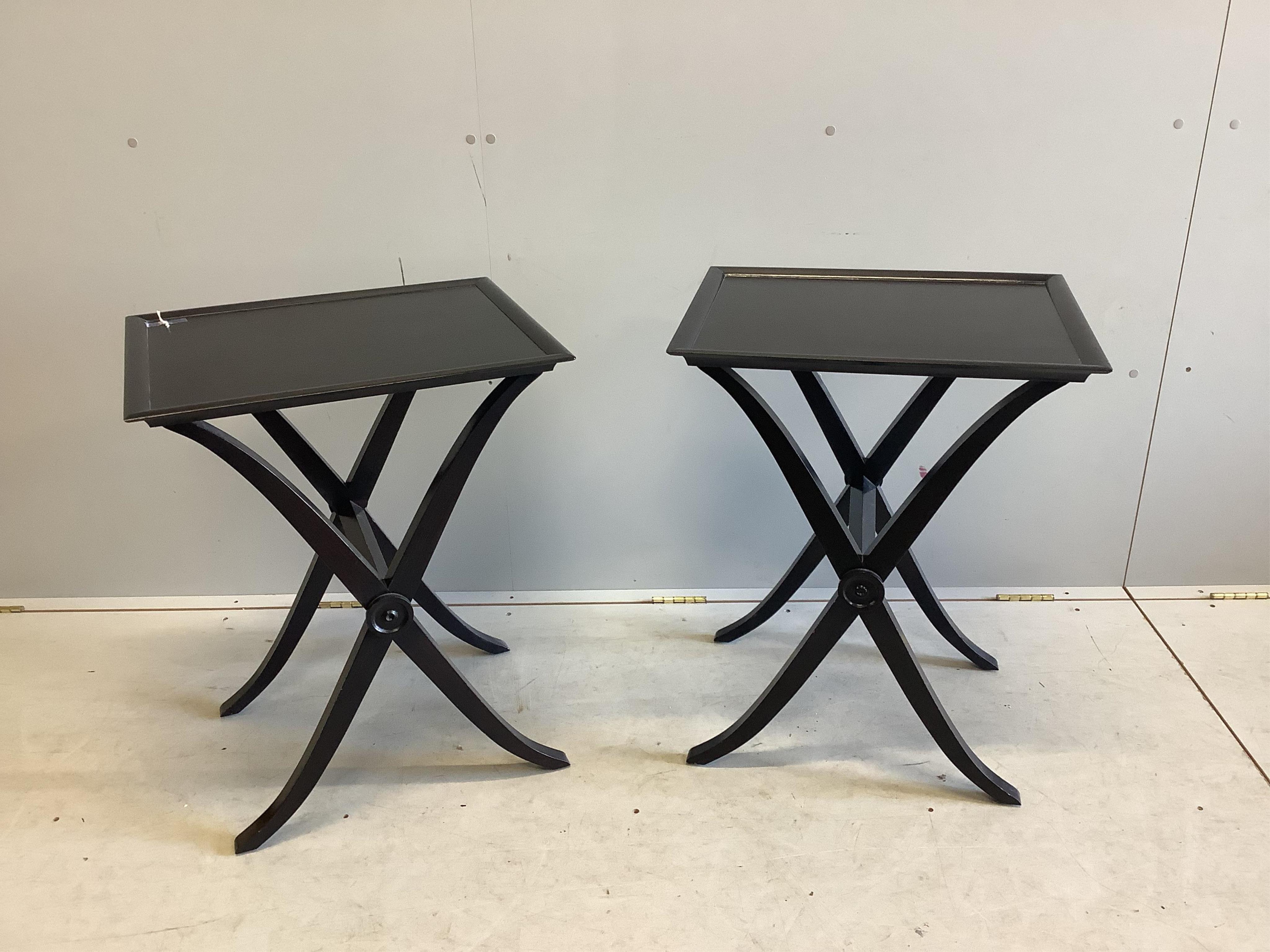 A pair of James Martin ebonised X frame lamp tables, width 55cm, depth 45cm, height 70cm. Condition - good